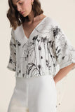 CORI - Blusa Box Estampa Flora - Verão 27